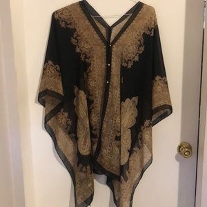 Sheer poncho cover up.